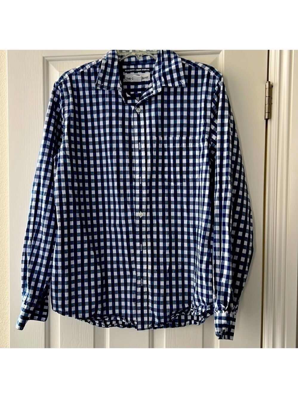 Men’s Old Navy blue and white plaid button up shirt.